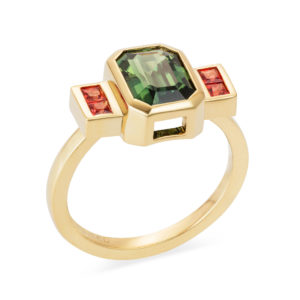 18ct gold large emerald cut green sapphire with chanel set orange sappire shoulders engagement ring lily kamper